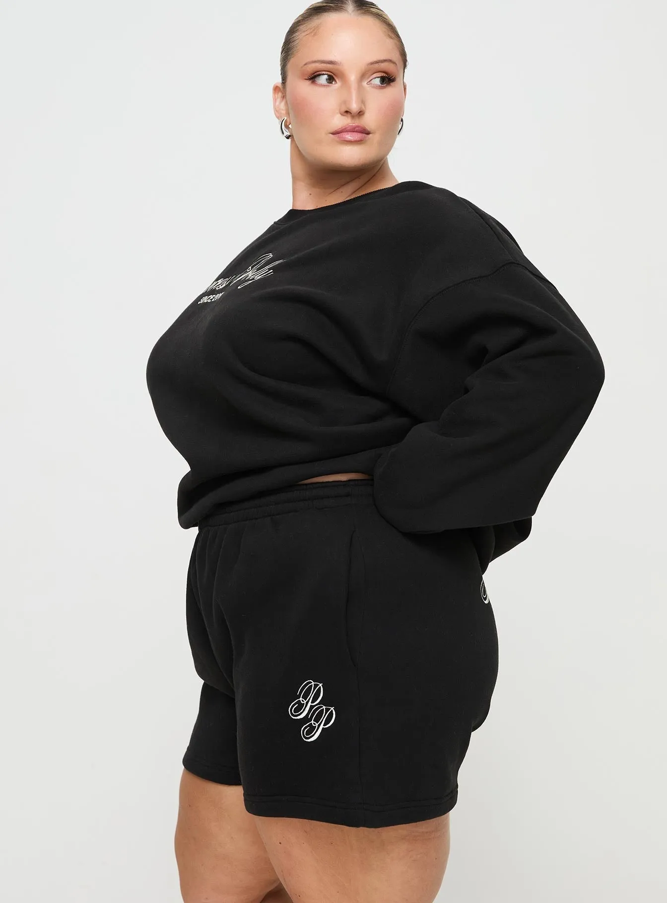 Princess Polly Track Shorts Cursive Text Black Sand Curve